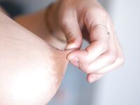 A Pregnant Shot Of FTV Violet In A Purple Dress Shows Her Dark Brown Nipples And Big Belly.