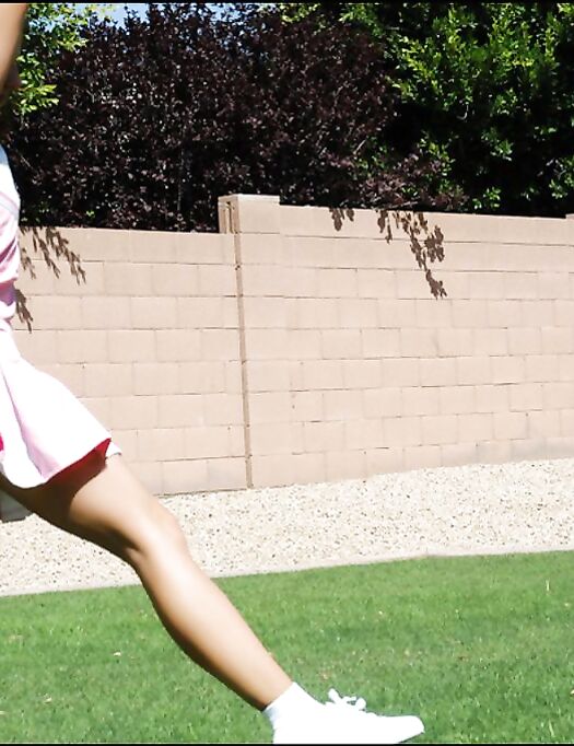 Jordan Capri With Small Tits And Bald Pussy Removes Everything Apart From Her Tiny Pink Skirt